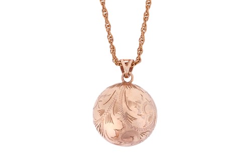 Lot 17 - A 9ct gold spherical photo frame locket on...