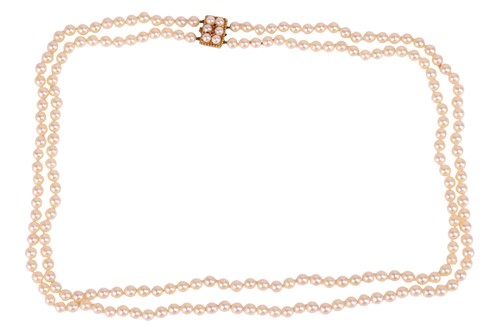 Lot 196 - A double row cultured pearl necklace with 9ct...