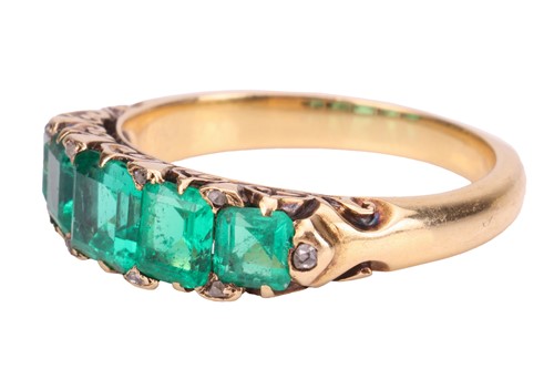 Lot 107 - A late Victorian emerald half-hoop ring,...