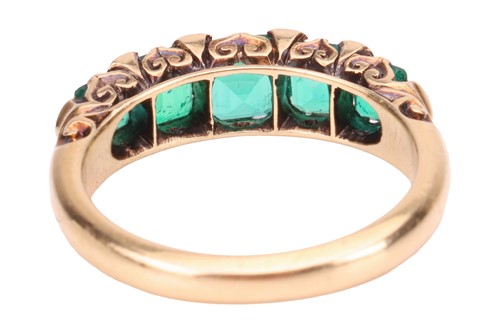 Lot 107 - A late Victorian emerald half-hoop ring,...