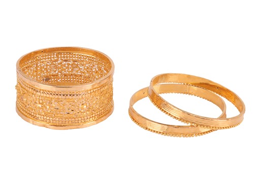 Lot 151 - Three closed bangles; the first bangle with...