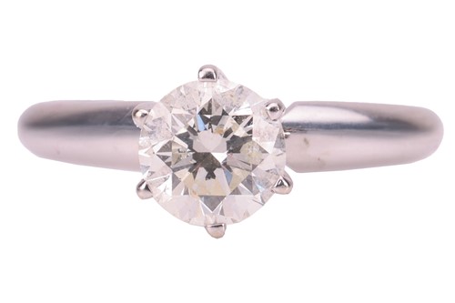 Lot 205 - A diamond solitaire engagement ring, claw-set...