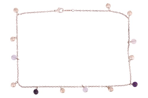 Lot 69 - Tiffany & Co. - a beaded necklace, suspending...