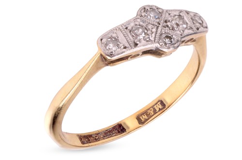 Lot A diamond-set panel ring, set with seven...