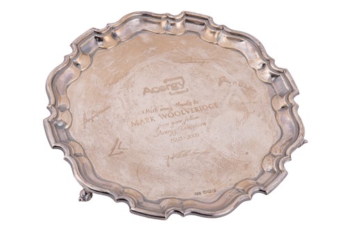 Lot A silver salver, circular with raised...