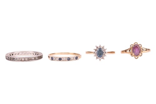 Lot 225 - Four gem-set rings; comprising a sapphire and...