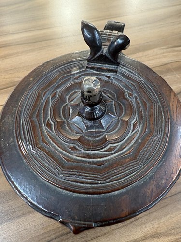 Lot 115 - A rare mid-17th-century engine-turned lignum...