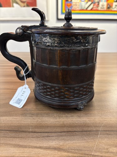 Lot 115 - A rare mid-17th-century engine-turned lignum...