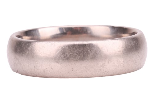 Lot A wedding band in 18ct white gold, comprising...