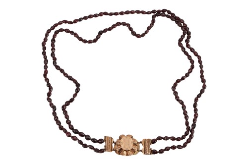 Lot 207 - A double row glass bead necklace, comprising...