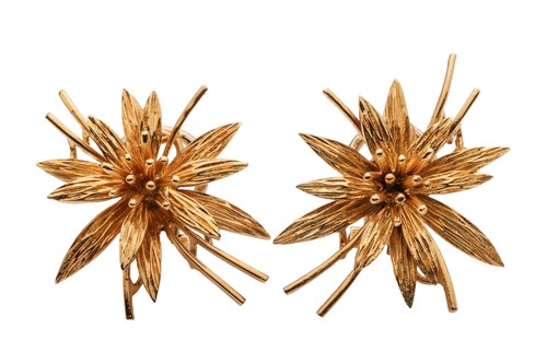 Lot 223 - A pair of floral clip-on earrings in 18ct gold,...