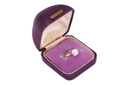 Lot 250 - An old-cut diamond solitaire ring, with an...