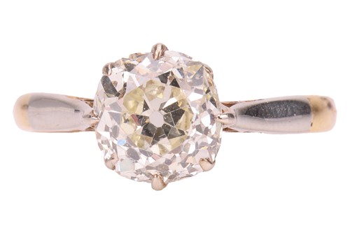 Lot 250 - An old-cut diamond solitaire ring, with an...