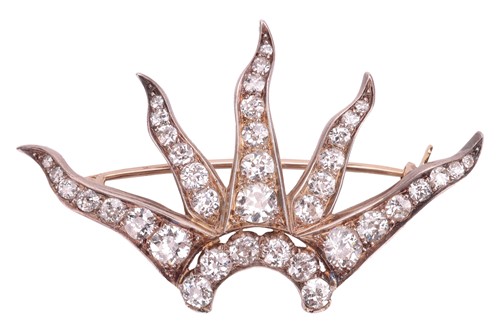 Lot 259 - An old-cut diamond sunburst brooch, with an...