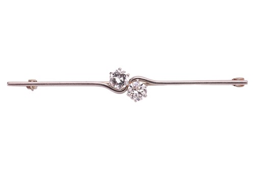 Lot An Art Deco two-stone diamond bar brooch, of...