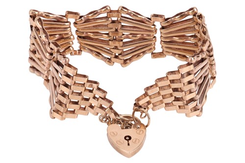 Lot A fancy gate link bracelet in 9ct yellow gold,...
