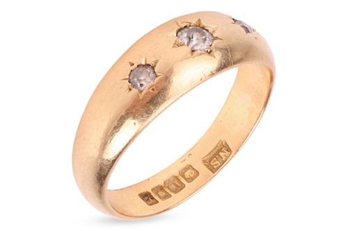 Lot A diamond-set gypsy ring in 18ct gold,...
