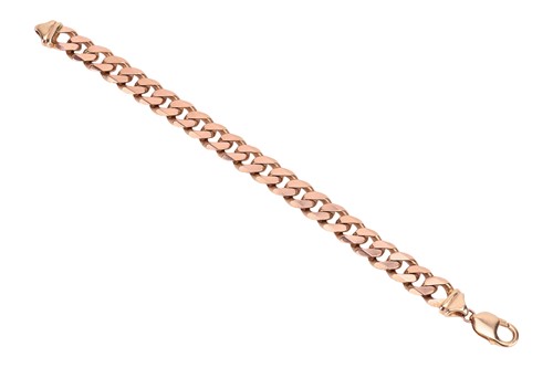 Lot 243 - A flat curb link bracelet in 9ct gold,...