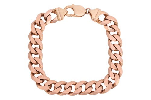 Lot A flat curb link bracelet in 9ct gold,...
