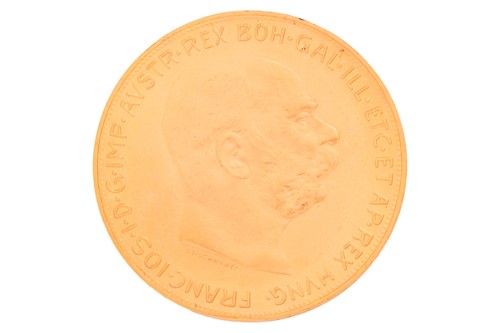 Lot 65 - A 1915 Austrian one hundred corona gold coin,...