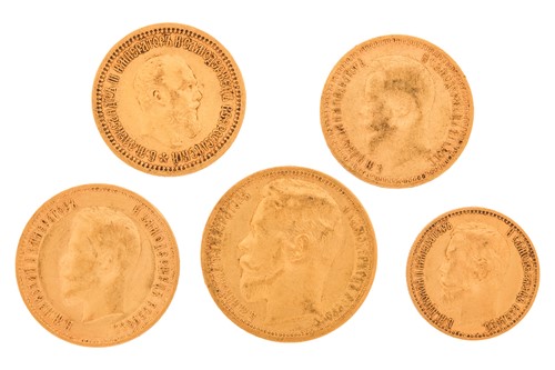 Lot 155 - A small collection of five Russian gold coins,...