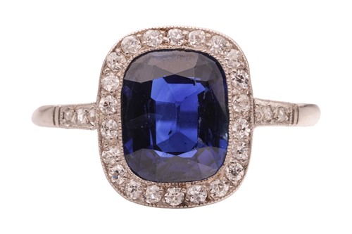 Lot An Art Deco sapphire and diamond halo ring,...
