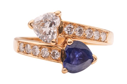 Lot 306 - Asprey - a sapphire and diamond Toi et Moi...