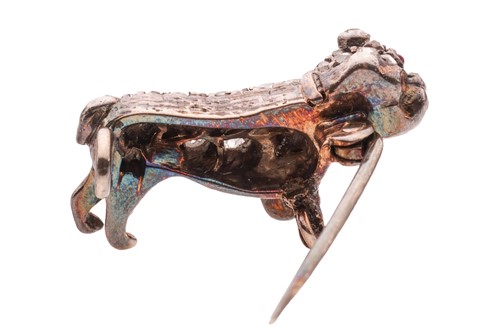 Lot 263 - A diamond-set bulldog pin, encrusted with...