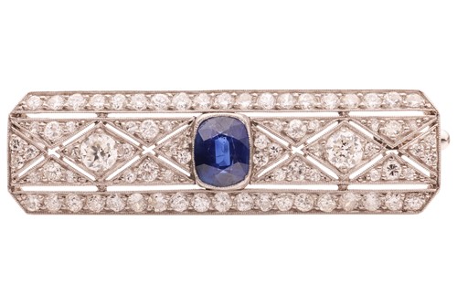 Lot 276 - An Art Deco sapphire and diamond bar brooch,...
