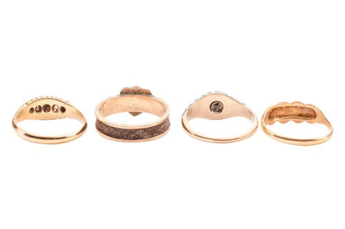 Lot 41 - A group of four gem-set rings; The first a...
