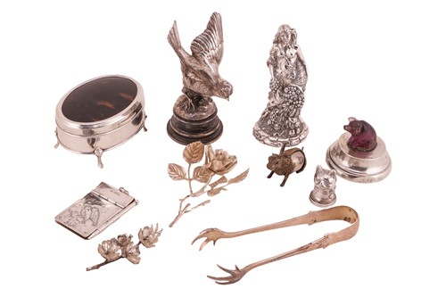 Lot 422 - A silver-plated figure of a sparrow with wings...