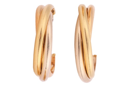 Lot 160 - Cartier - a pair of trinity hoop earrings,...