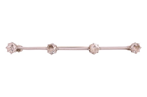 Lot 99 - An old-cut diamond bar brooch, with an...