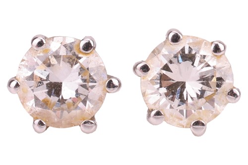 Lot 91 - A pair of diamond stud earrings in 18ct white...