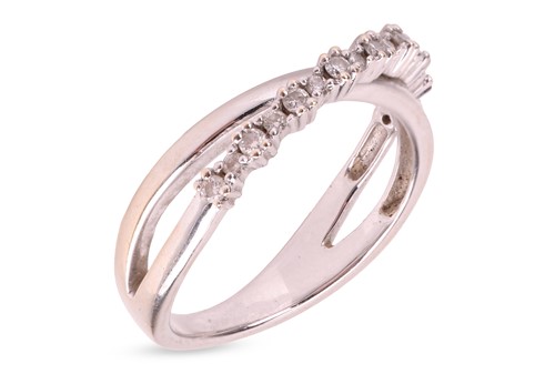 Lot 83 - A diamond-set ring of crossover design,...
