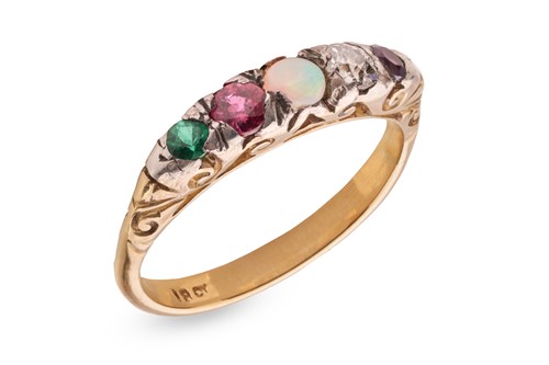 Lot 24 - An acrostic 'Adore' ring, spelt out with...