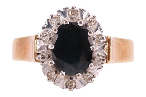Lot 151 - A sapphire and diamond cluster ring,...
