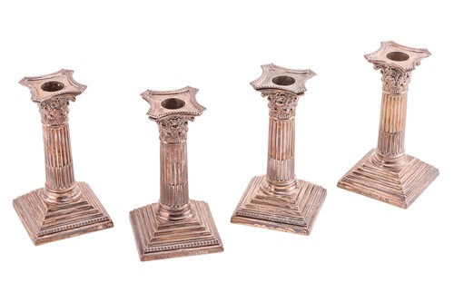 Lot 408 - A set of four loaded silver Corinthian column...