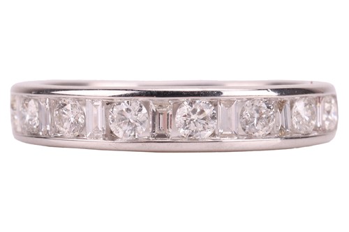 Lot 75 - A diamond-set half-eternity ring in 9ct white...