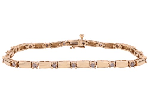 Lot 44 - A diamond-set link bracelet in 9ct gold,...