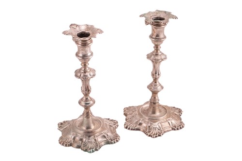 Lot 415 - A pair of George II cast silver table...