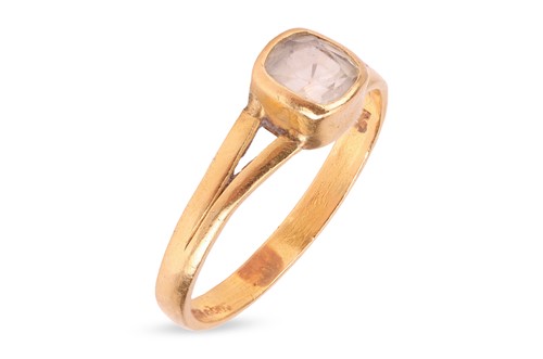 Lot 143 - A white sapphire solitaire ring, the...