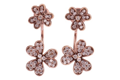 Lot 221 - A pair of diamond-set floral earrings, each of...
