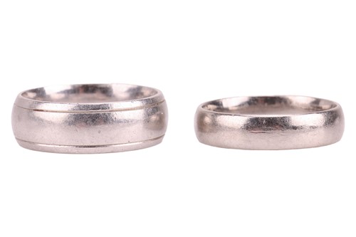 Lot 164 - A palladium wedding band and another in...