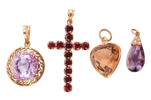 Lot 27 - Four gem-set pendants, comprising a smoky...