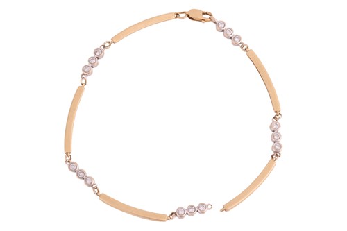 Lot 9 - A diamond-set line bracelet, containing...