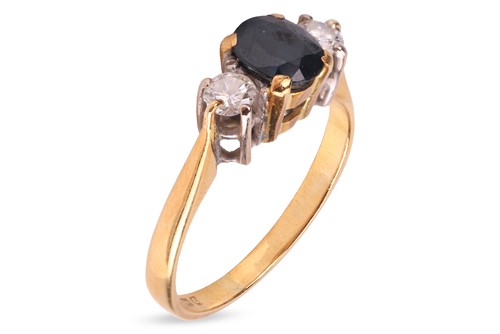 Lot 178 - A sapphire and diamond trilogy ring in 18ct...