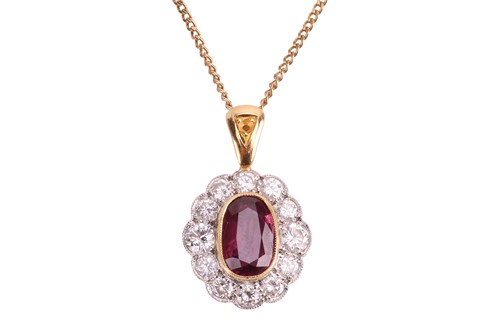 Lot 131 - A ruby and diamond cluster pendant on chain,...