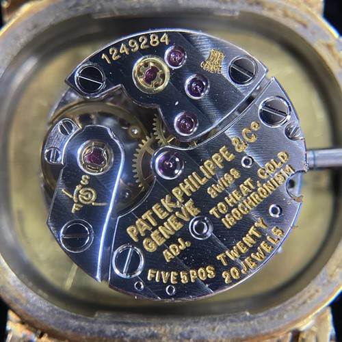 Lot 366 - Patek Philippe An 18ct Gold Diamond-set Dress...