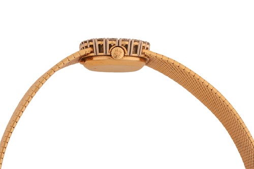 Lot 366 - Patek Philippe An 18ct Gold Diamond-set Dress...